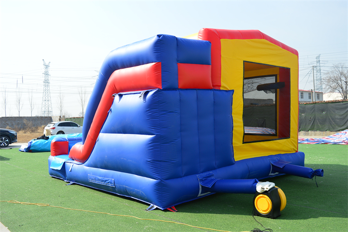 Red, yellow and blue bounce house FWC297