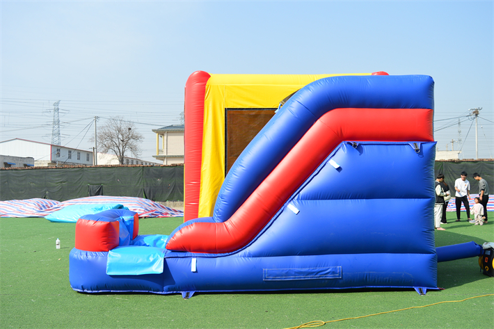 Red, yellow and blue bounce house FWC297